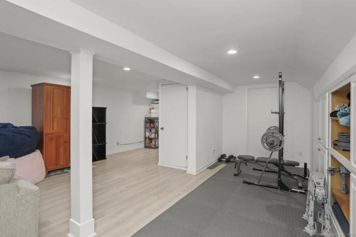 A home gym with gym equipment.