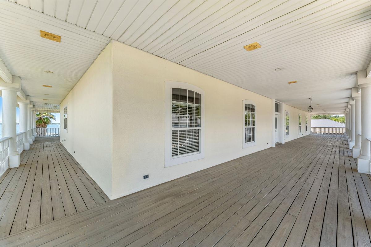 Balcony with wood flooring.