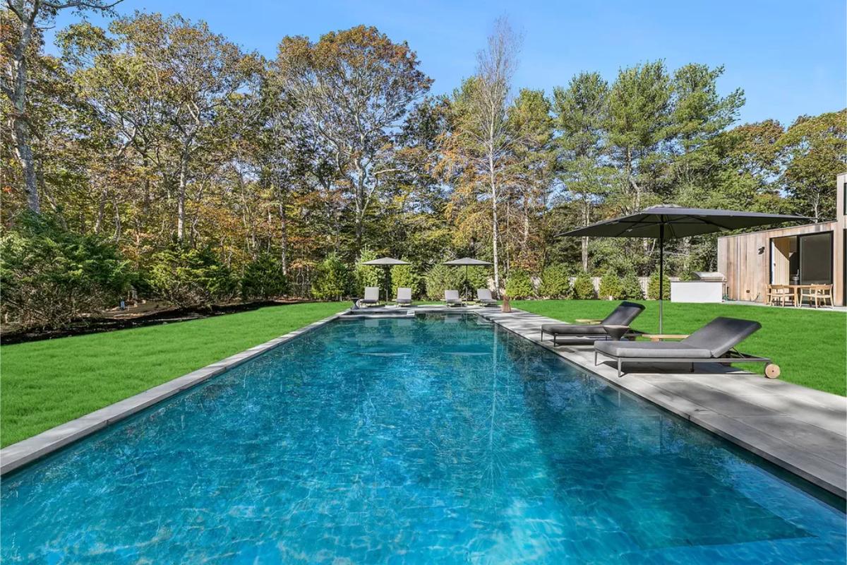 Pool with lounge chairs.