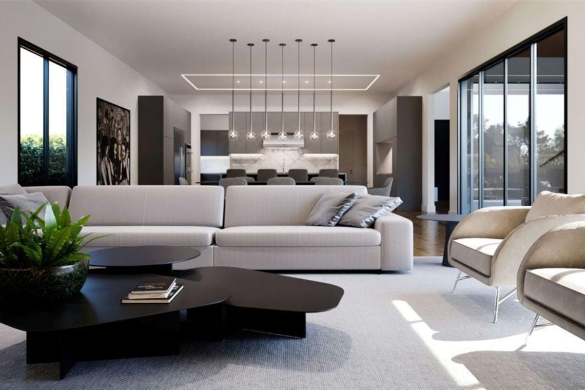 A great room with living space, dining area, and kitchen.