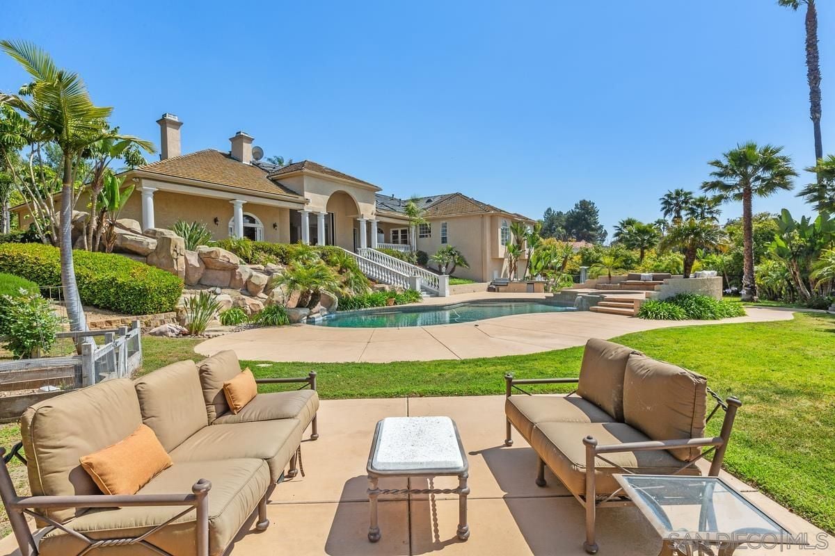 A patio with couches and a center table.