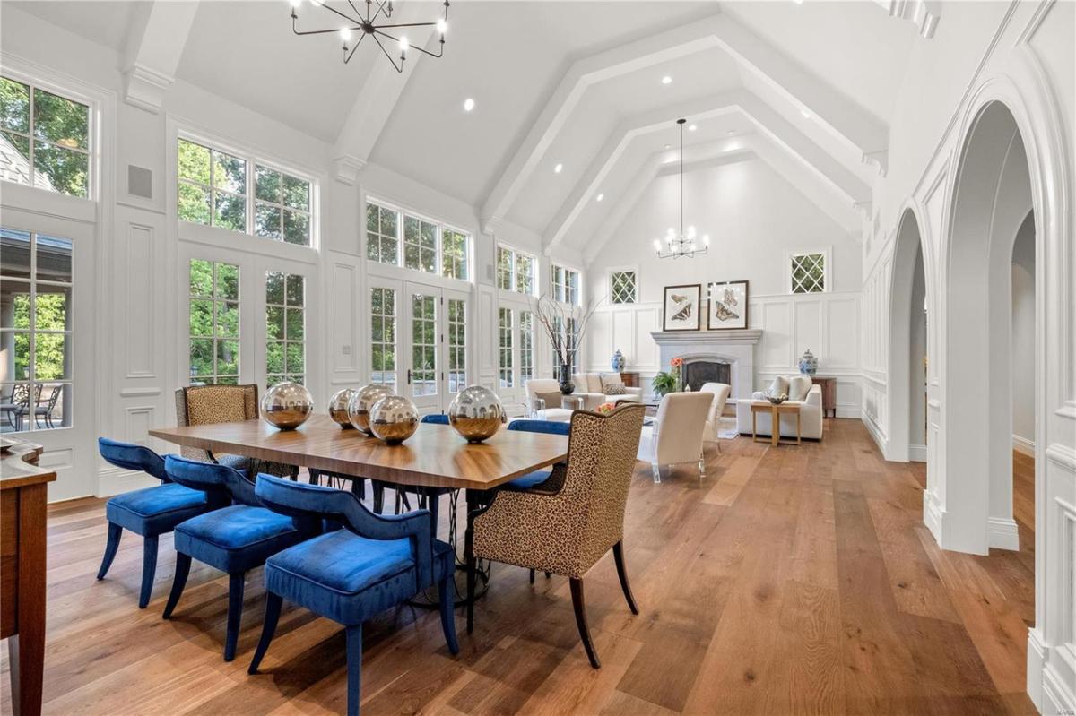 Dining room with wood tables and chairs.