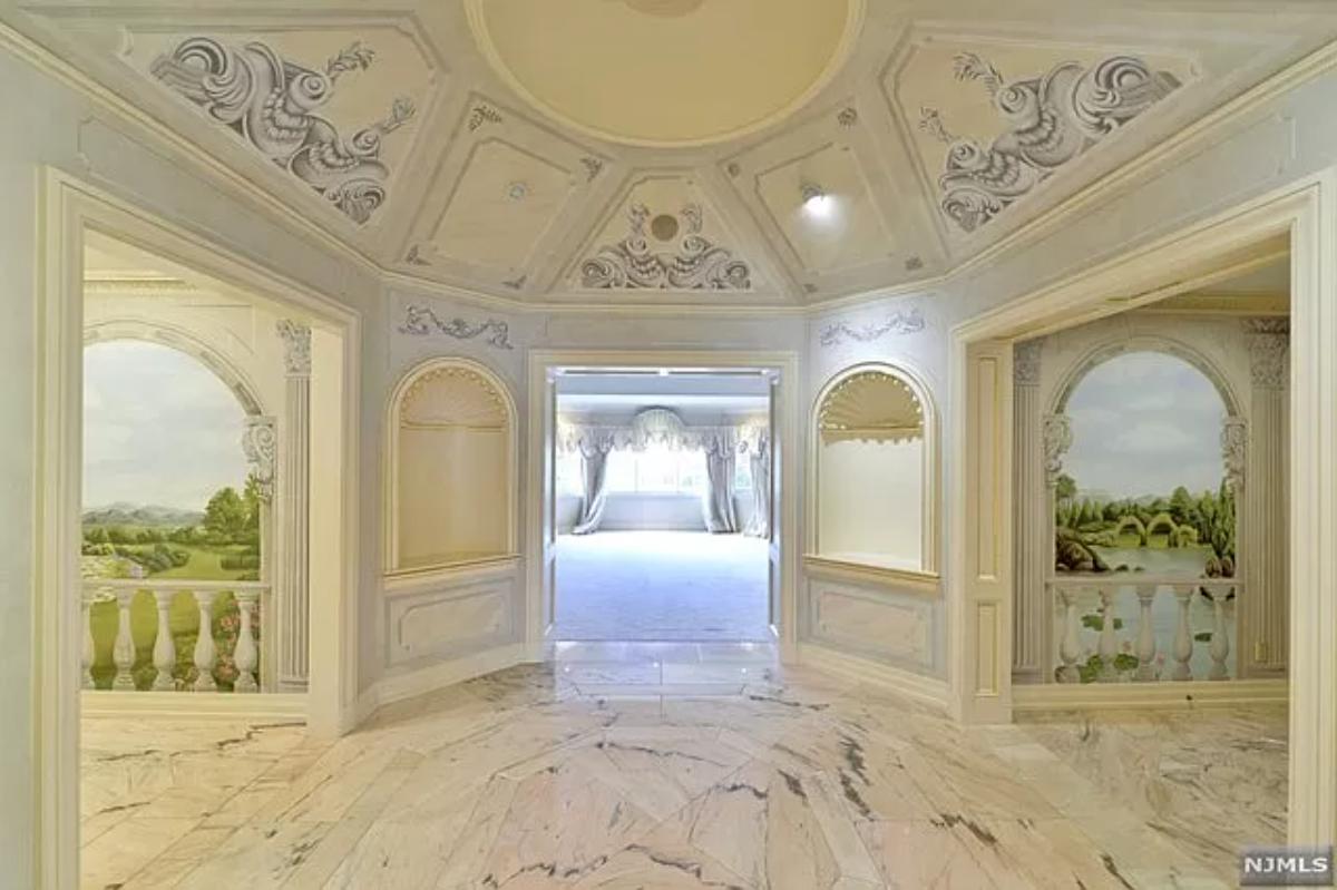Bedroom with a grand entrance.