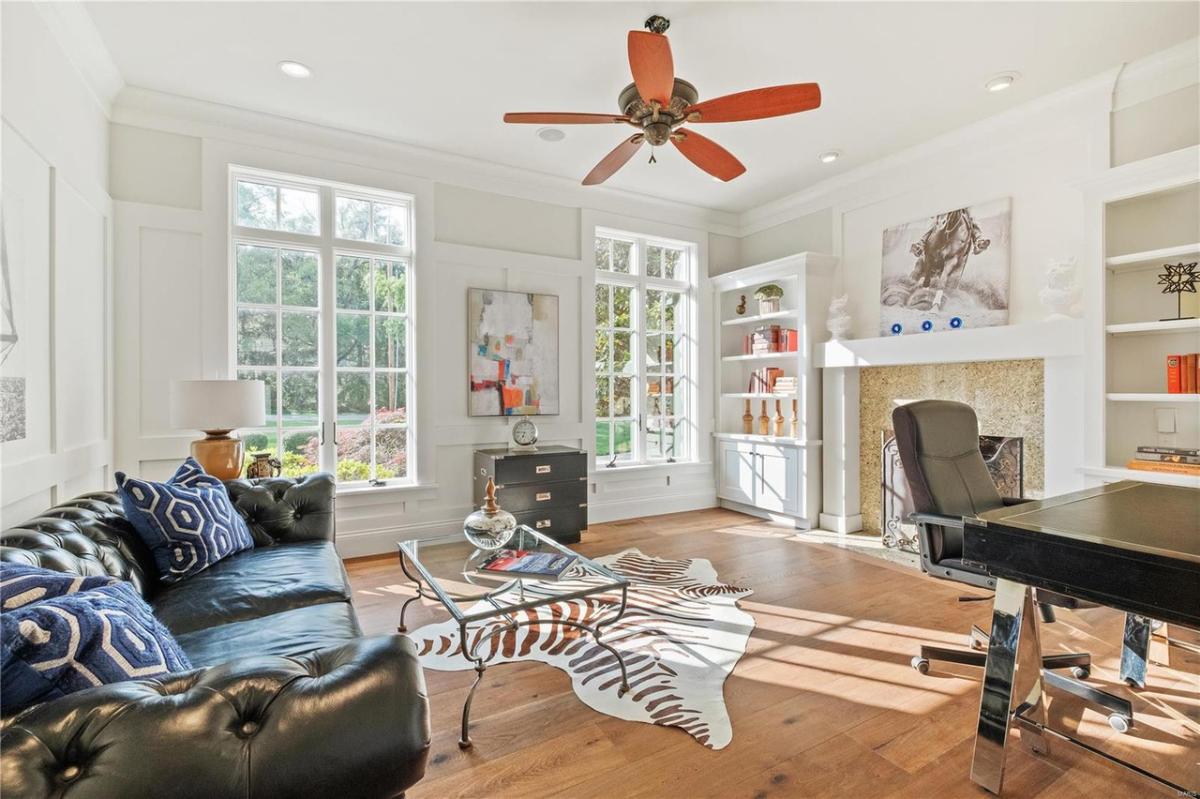 Home office with a couch.