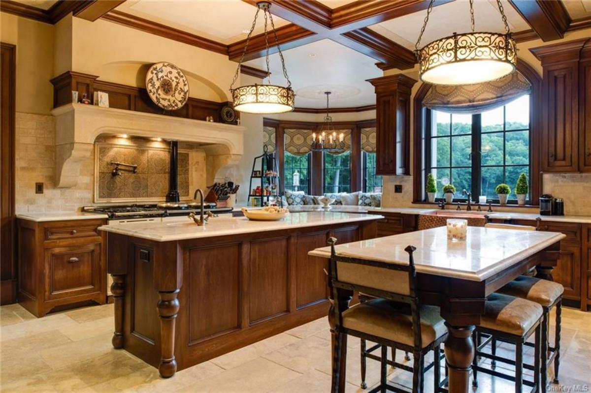 Kitchen with a breakfast nook and a center island prep area.