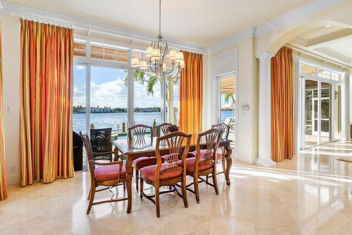 Dining room with a wood table and chairs.