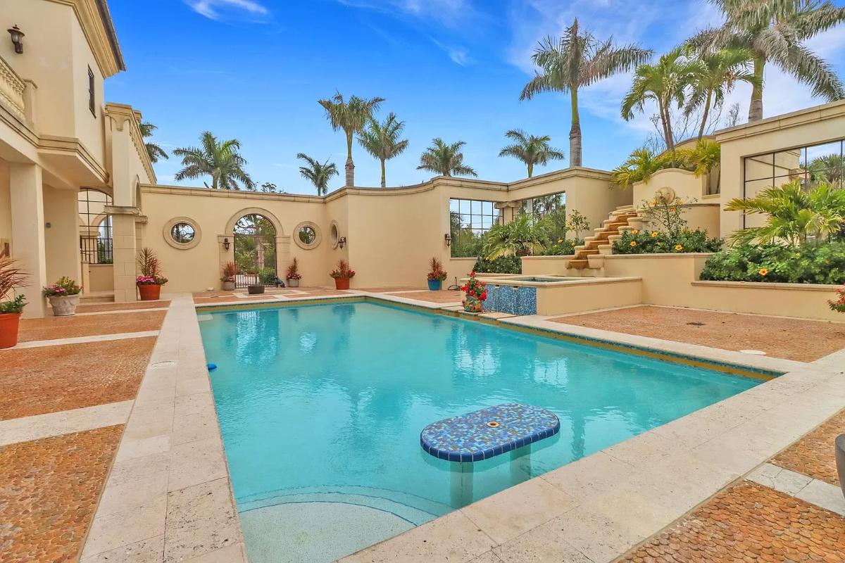 Pool with a spillover waterfall.