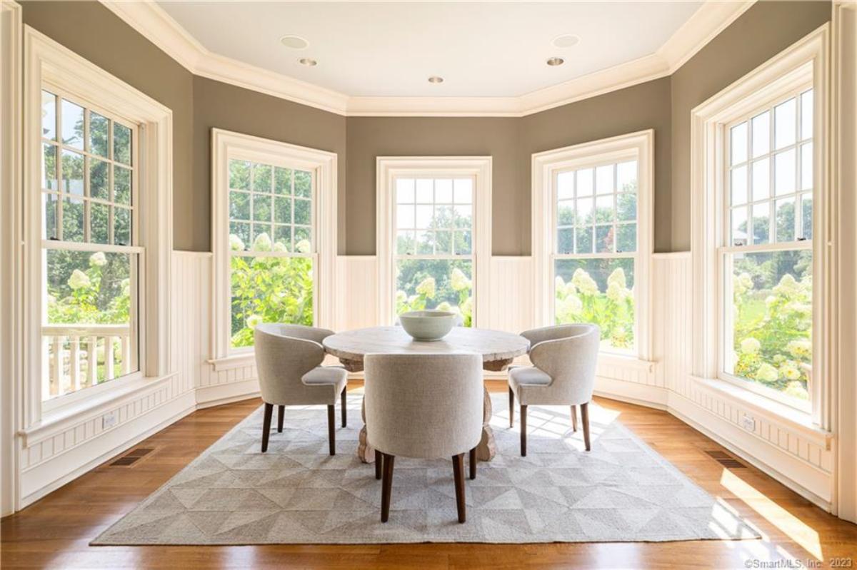 Breakfast nook with glass windows.
