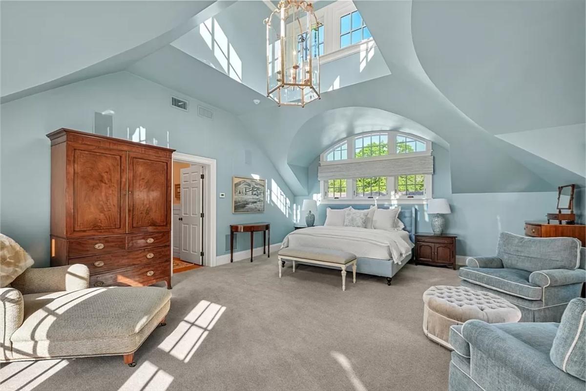 Bedroom with a private living space.
