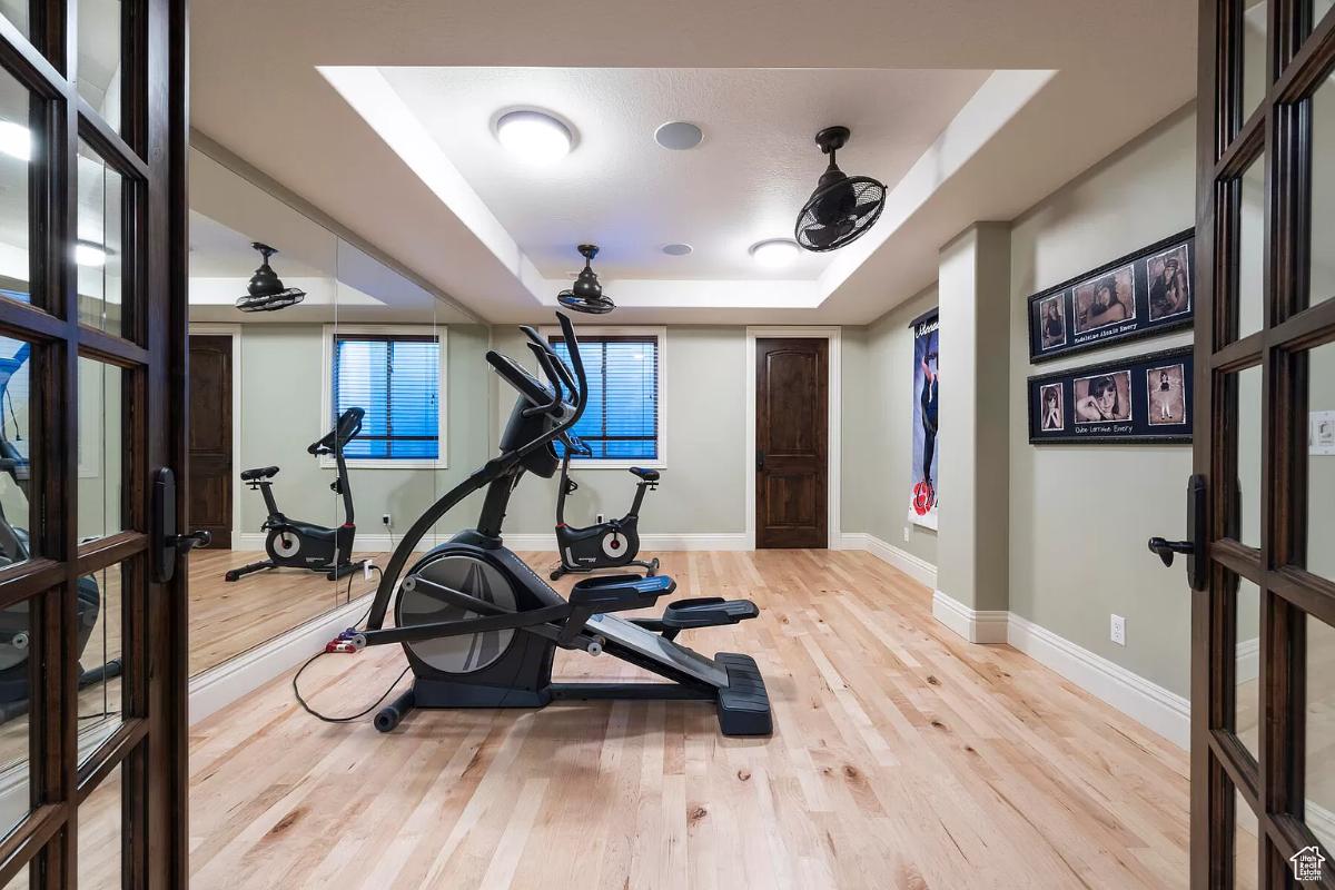 Home gym with huge mirrors.