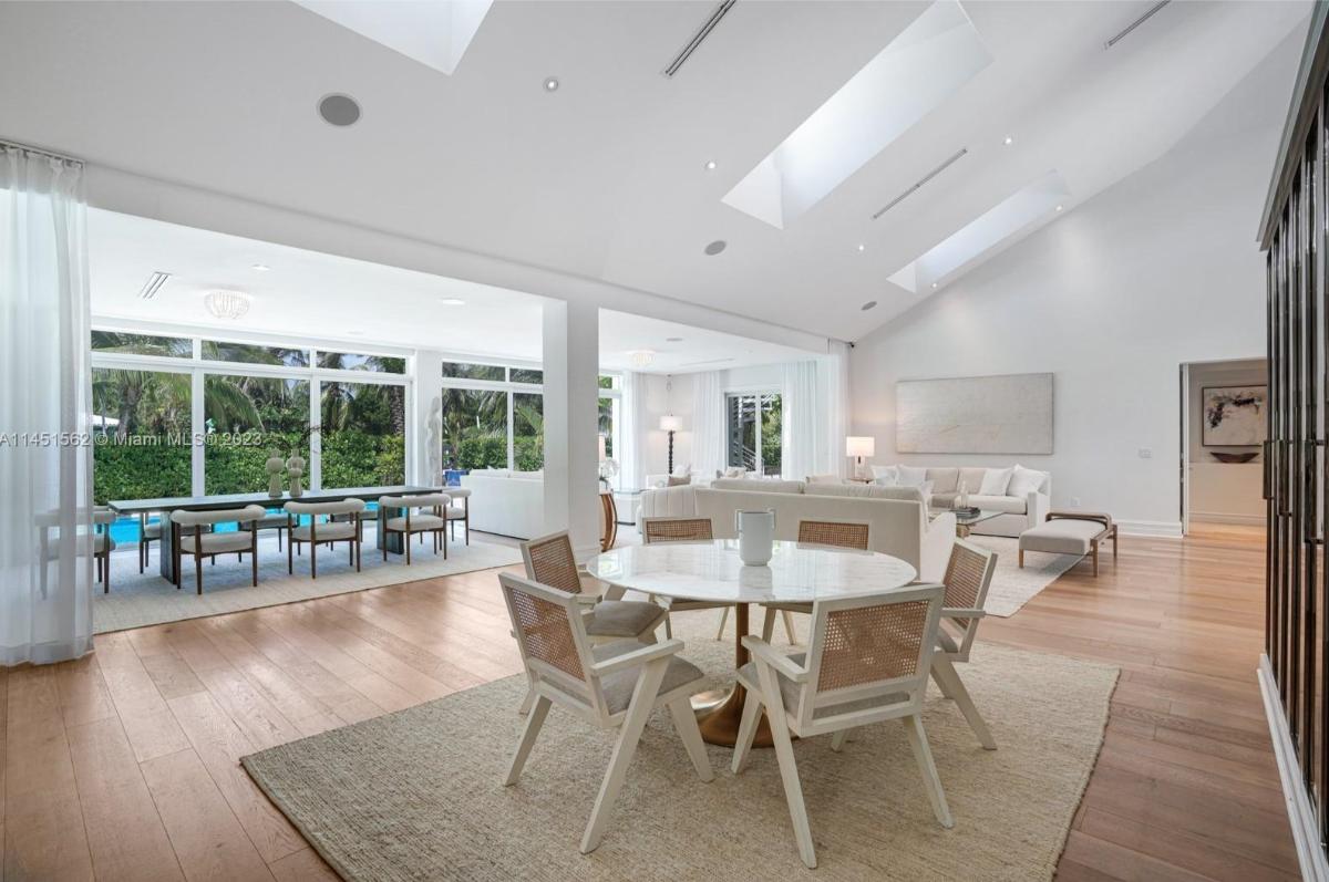Breakfast nook with a round table and chairs.