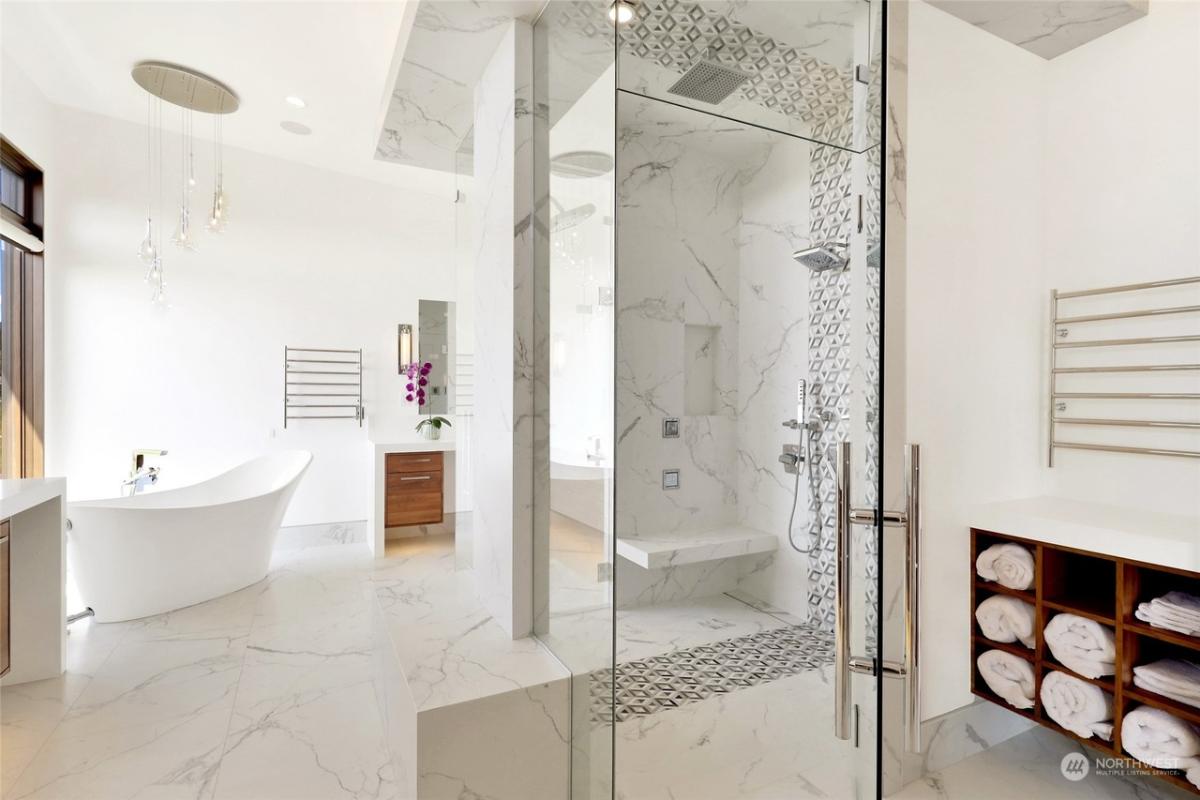 Bathroom with a soaking tub and a walk-in shower.