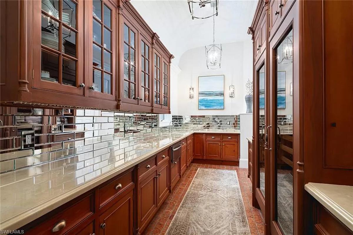Pantry with custom cabinetry.