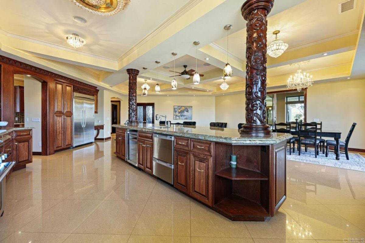 A kitchen with countertops and cabinets.