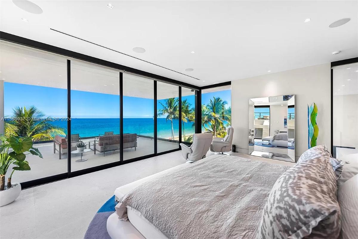 Bedroom with a balcony.