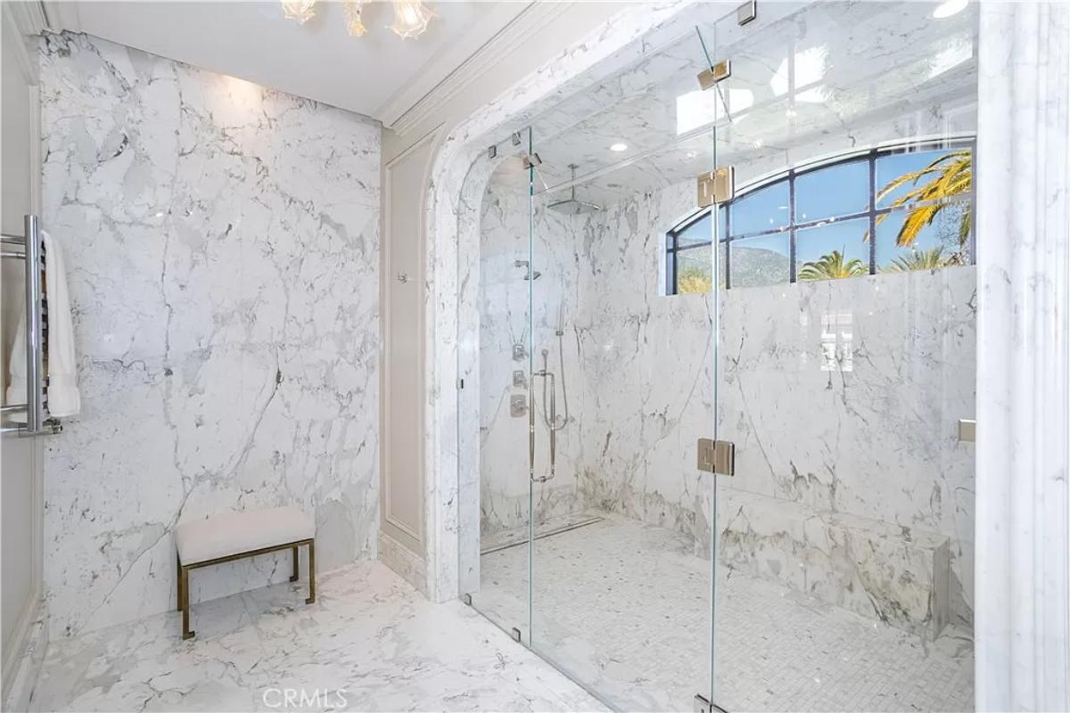 Bathroom with a walk-in shower.