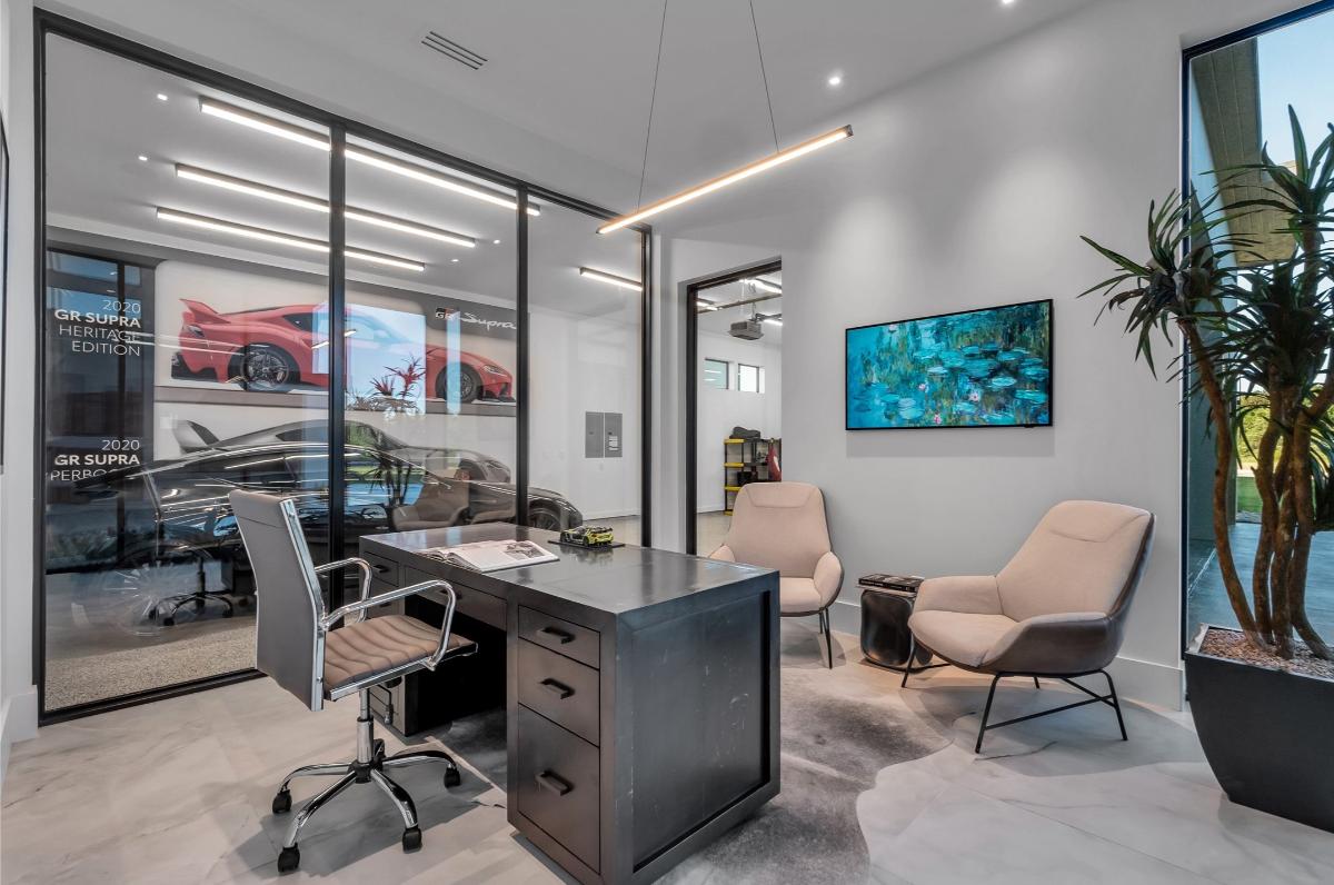 Home office with custom lighting.