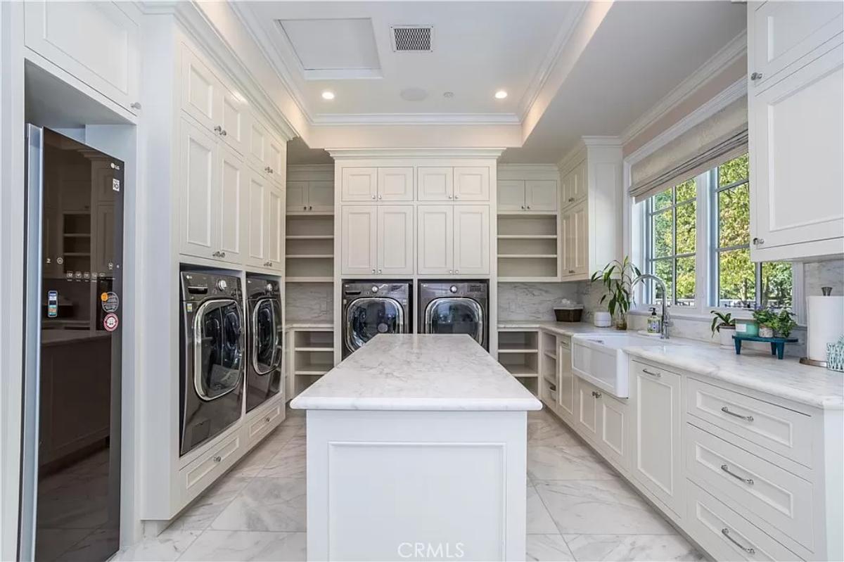 Laundry room with custom cabinetry.