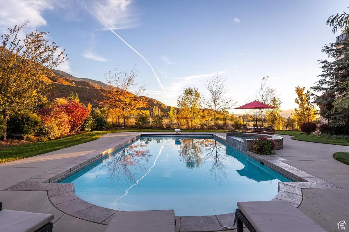 Pool with lounge chairs.