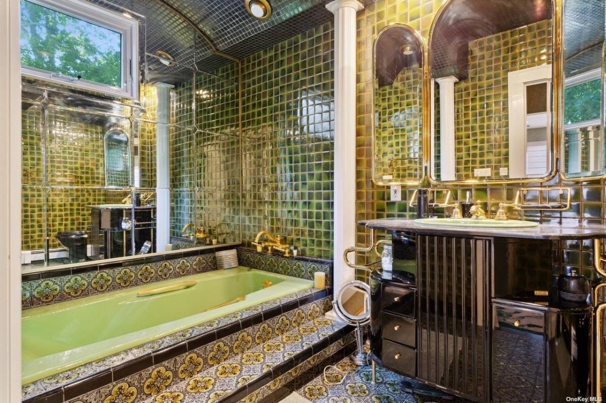 Bathroom with a custom-made vanity and a soaking tub.