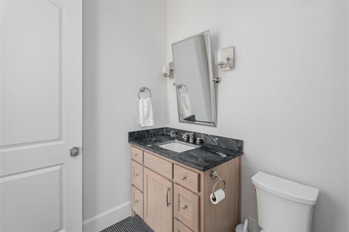 Bathroom with a sink and toilet.