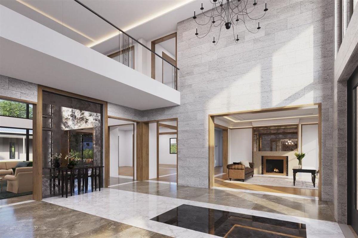 A foyer with a tiled floor and a chandelier.