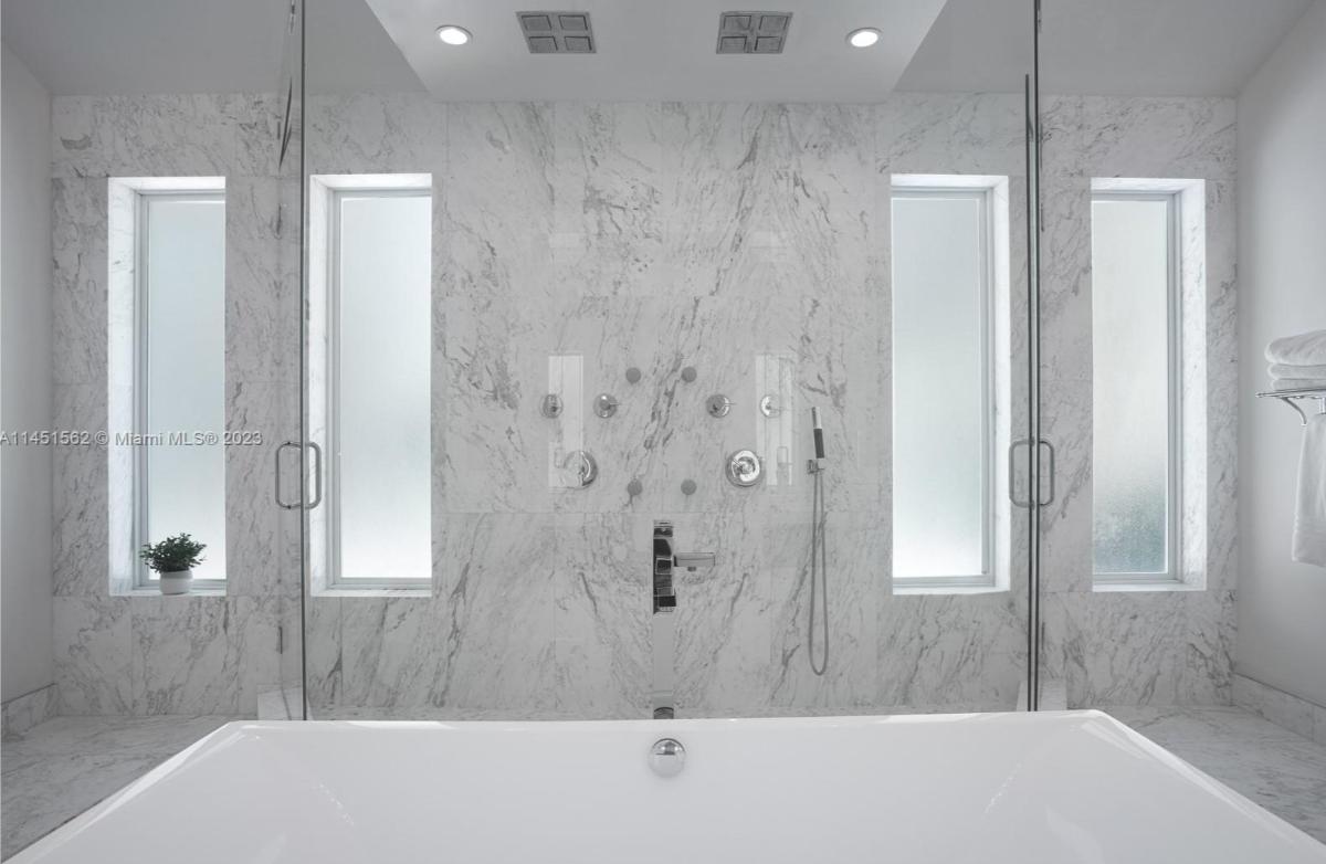 Bathroom with a walk-in shower and a soaking tub.