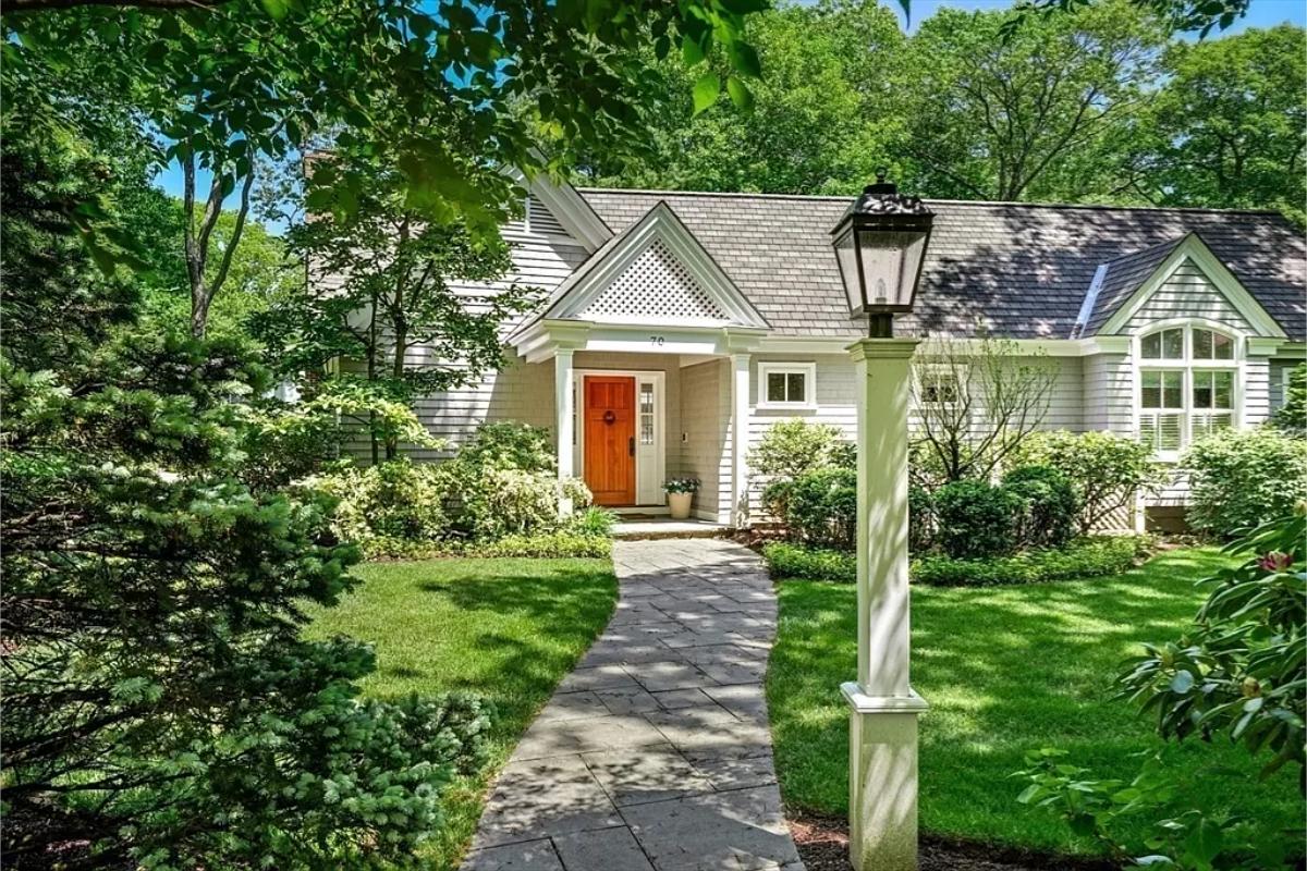 Guest house with landscaped manicured grounds.