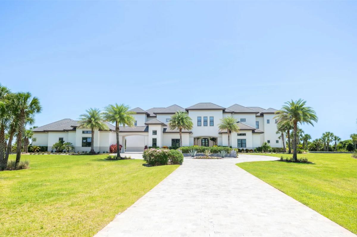 Front view of the 9,676 Sq. Ft. Estate in Palm Coast, FL.