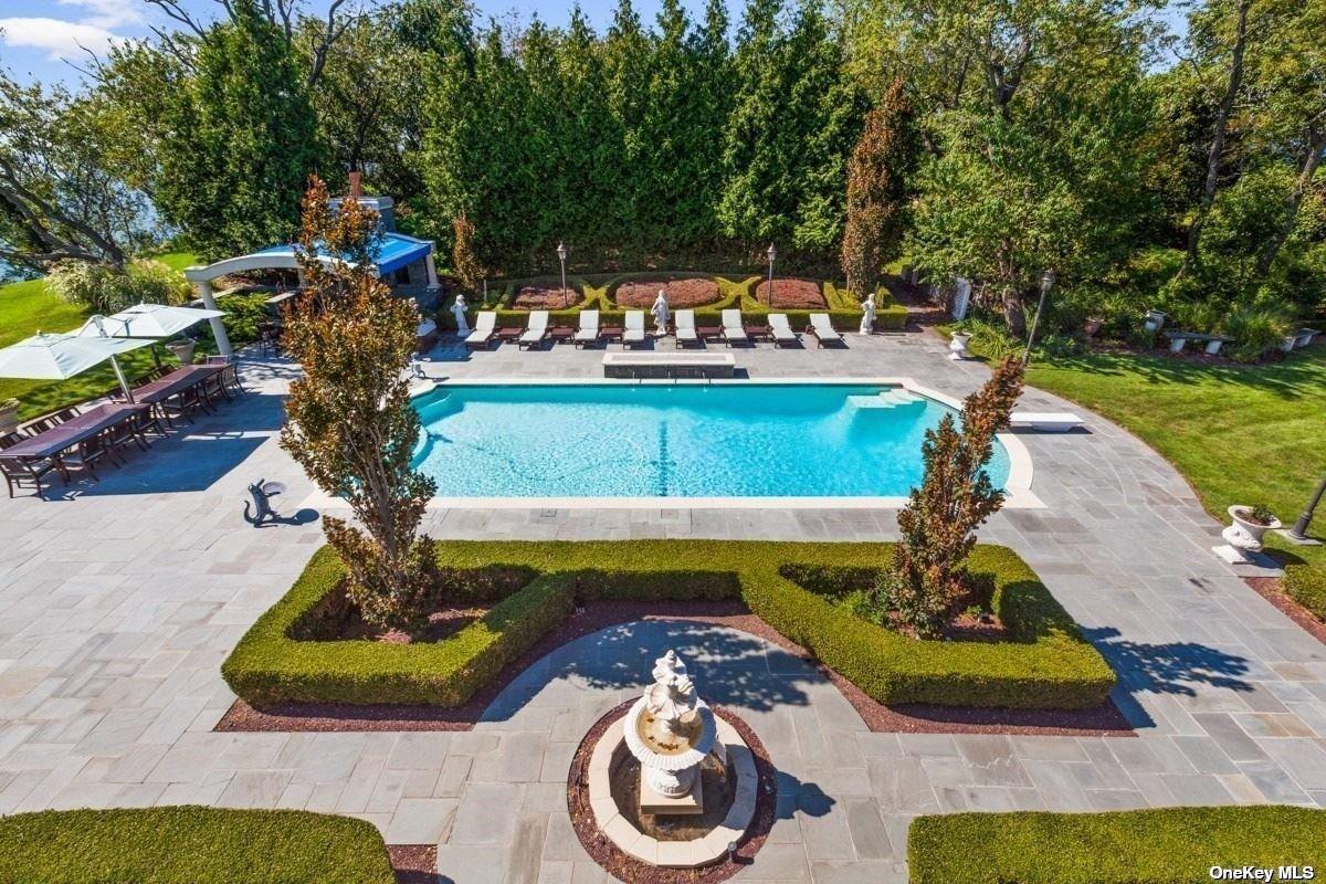 Pool with lounge chairs.