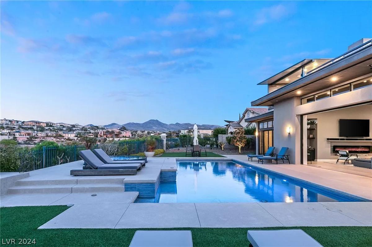 Pool with lounge chairs.