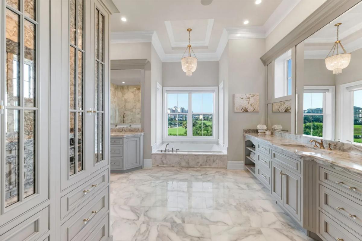 Bathroom with a custom-made vanity and a soaking tub.