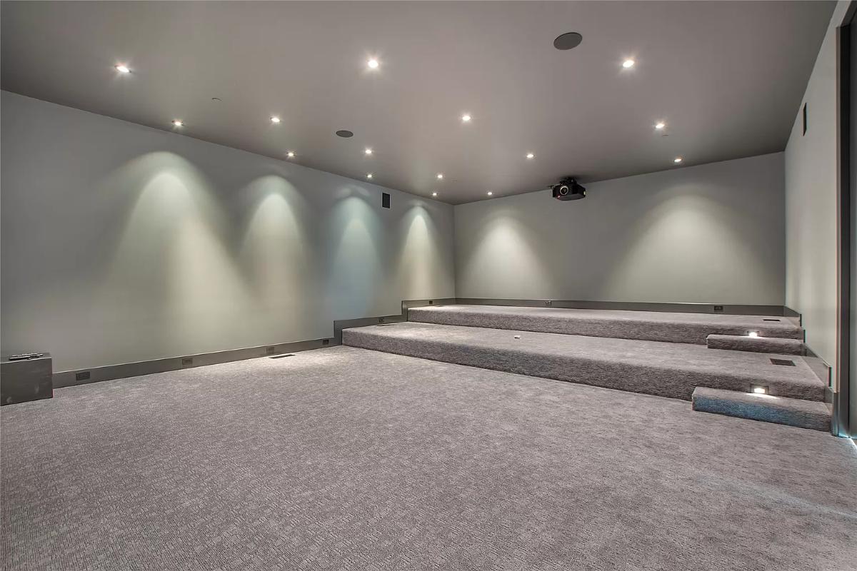 Home theater with custom lighting.