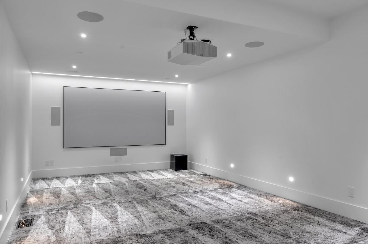 Home theater with custom lighting.