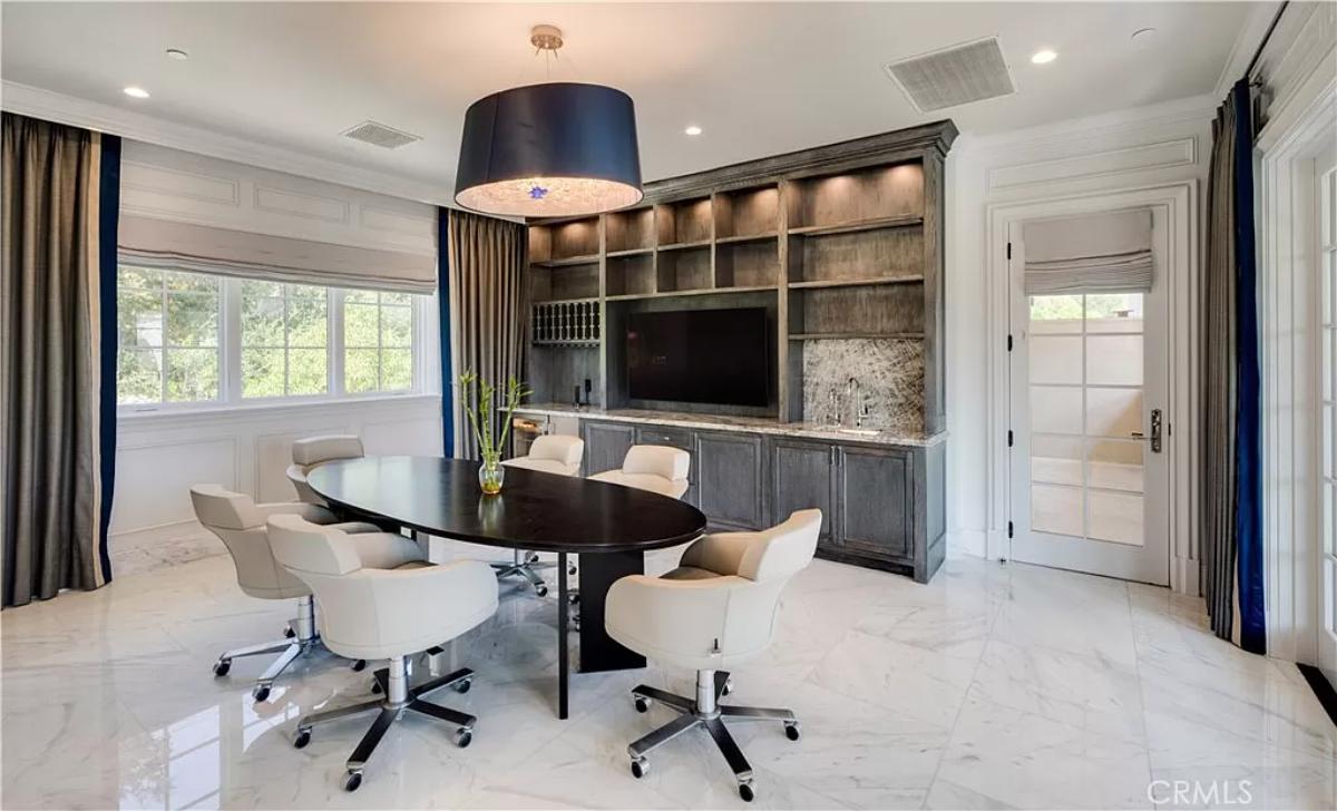 Dining room with custom lighting.