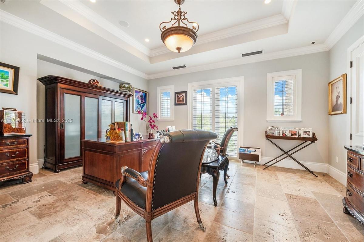 Home office with a hardwood desk.