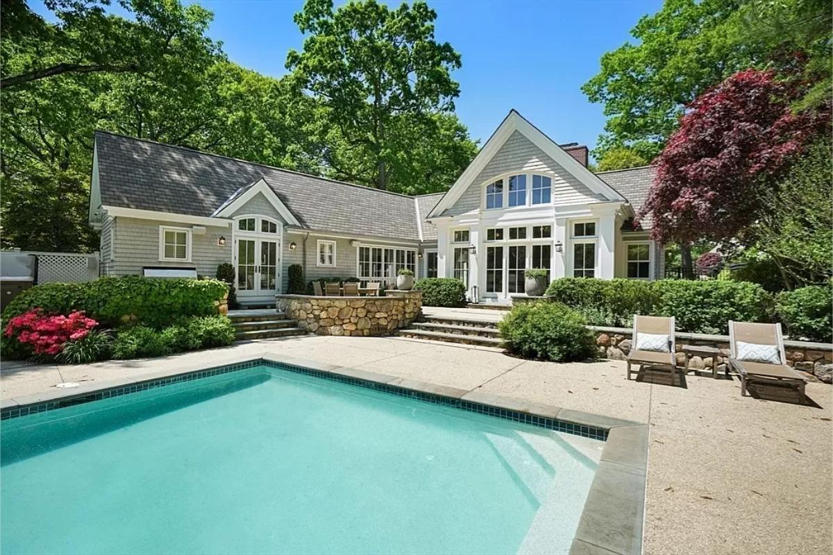 Pool with lounge chairs.