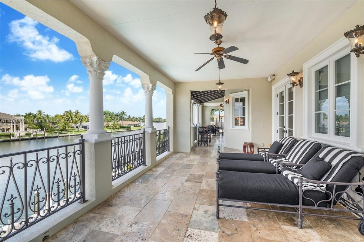 Balcony with lounge chairs.