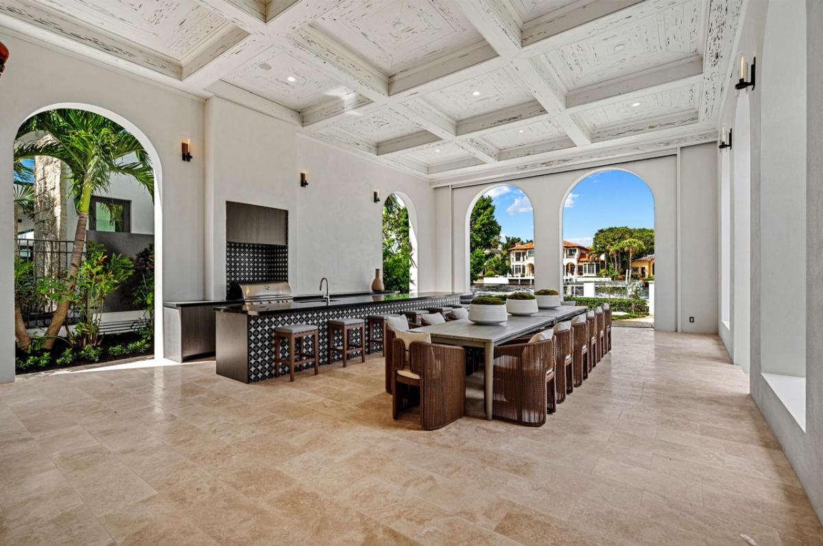 Grill area with a dining table.