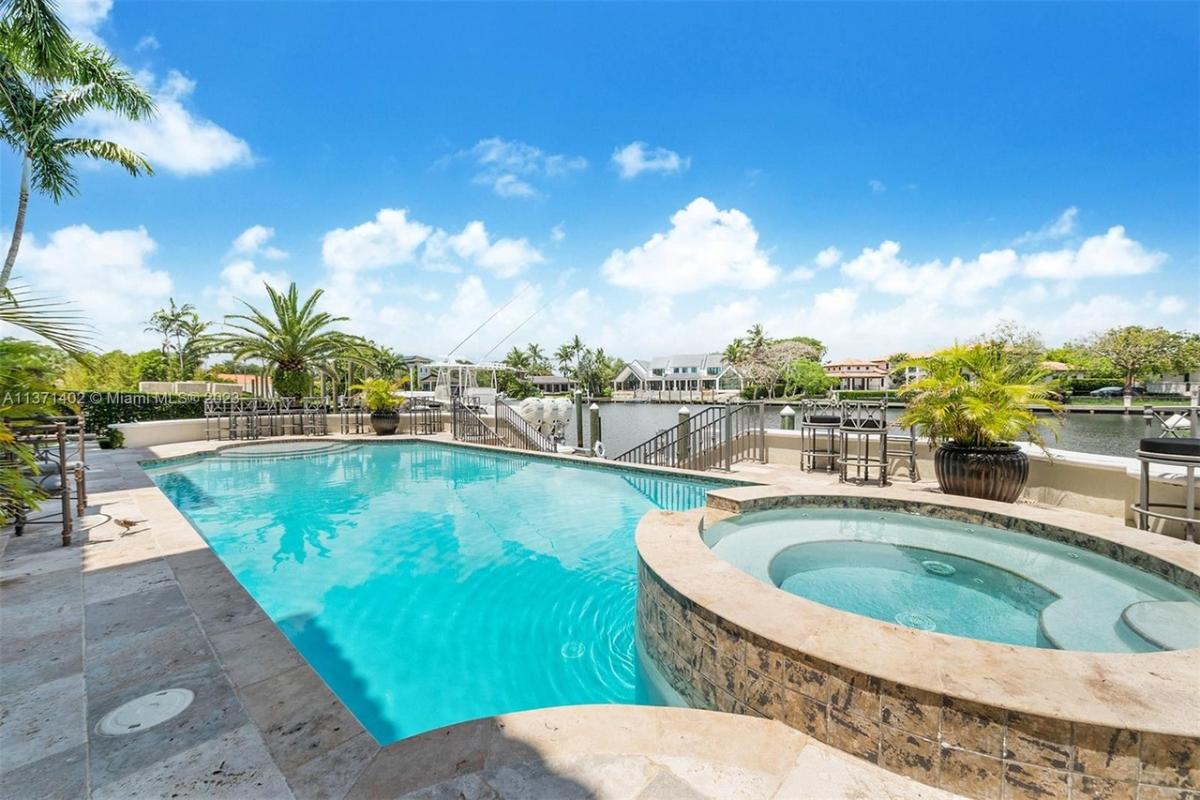 Pool with a jacuzzi.