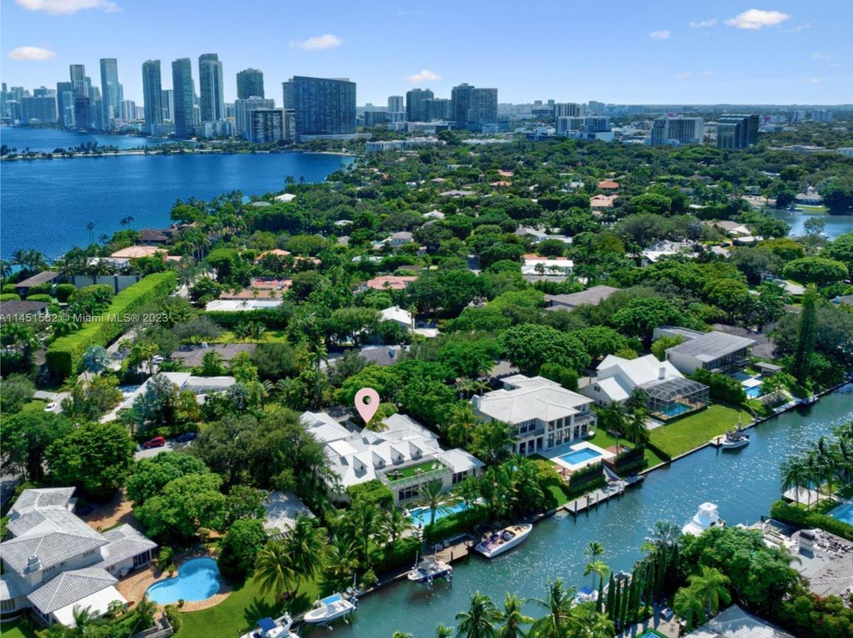 Aerial view of the property with a boat dock.