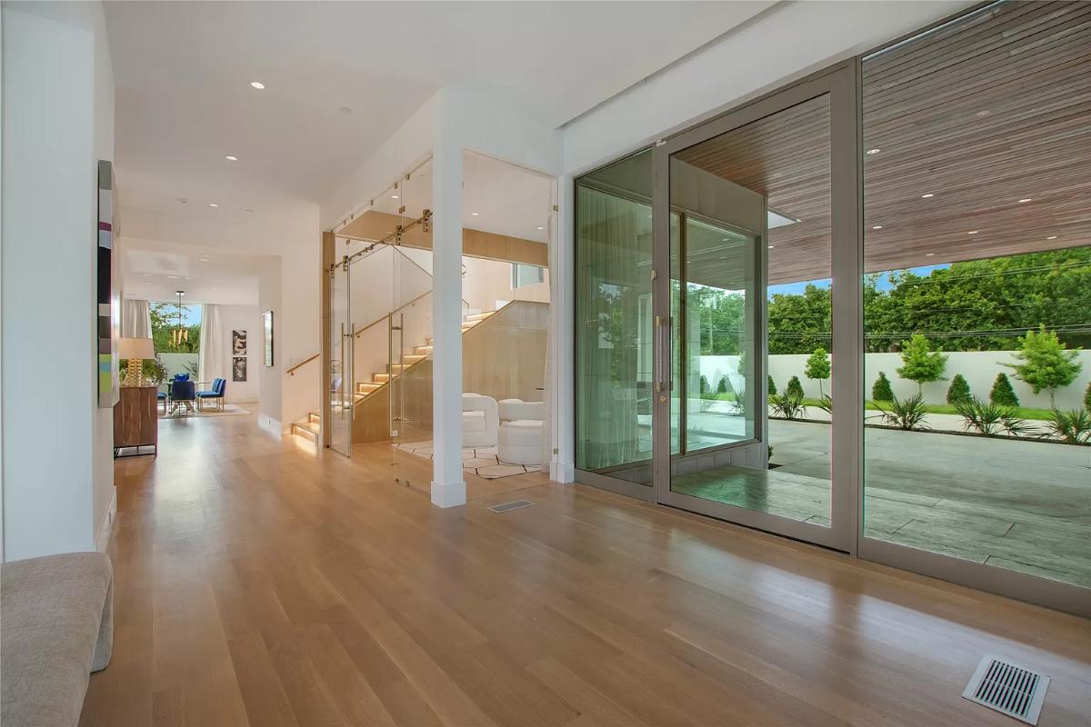 Foyer with a huge glass doors.