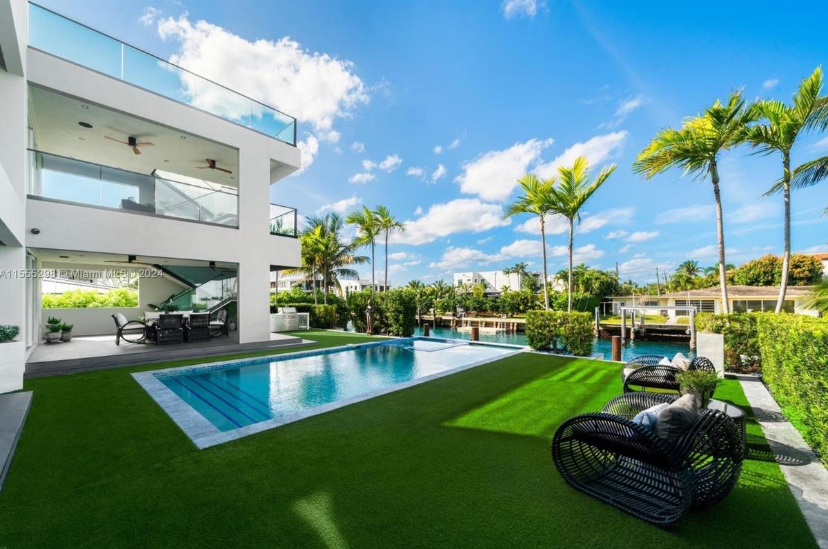 Pool with lounge chairs.