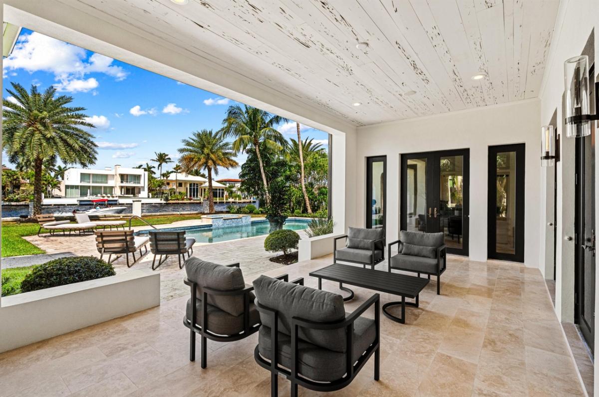 Patio with a table and chairs.