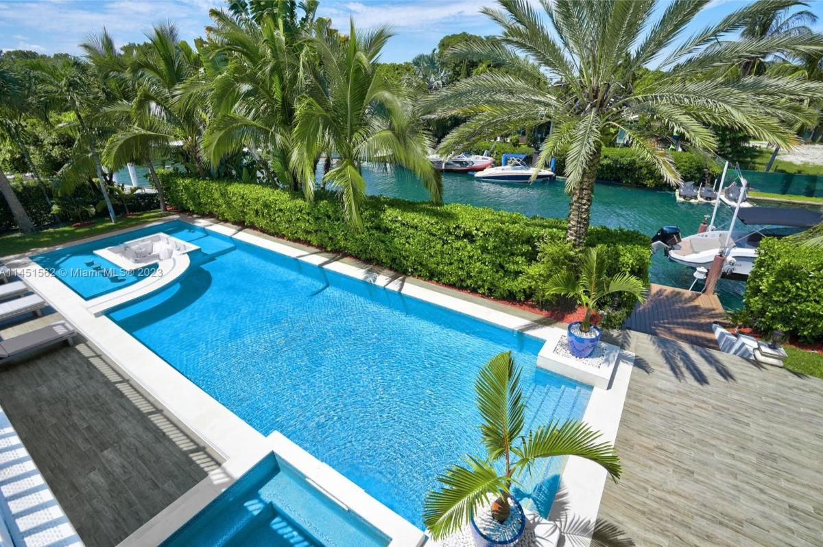 Pool with lounge chairs.