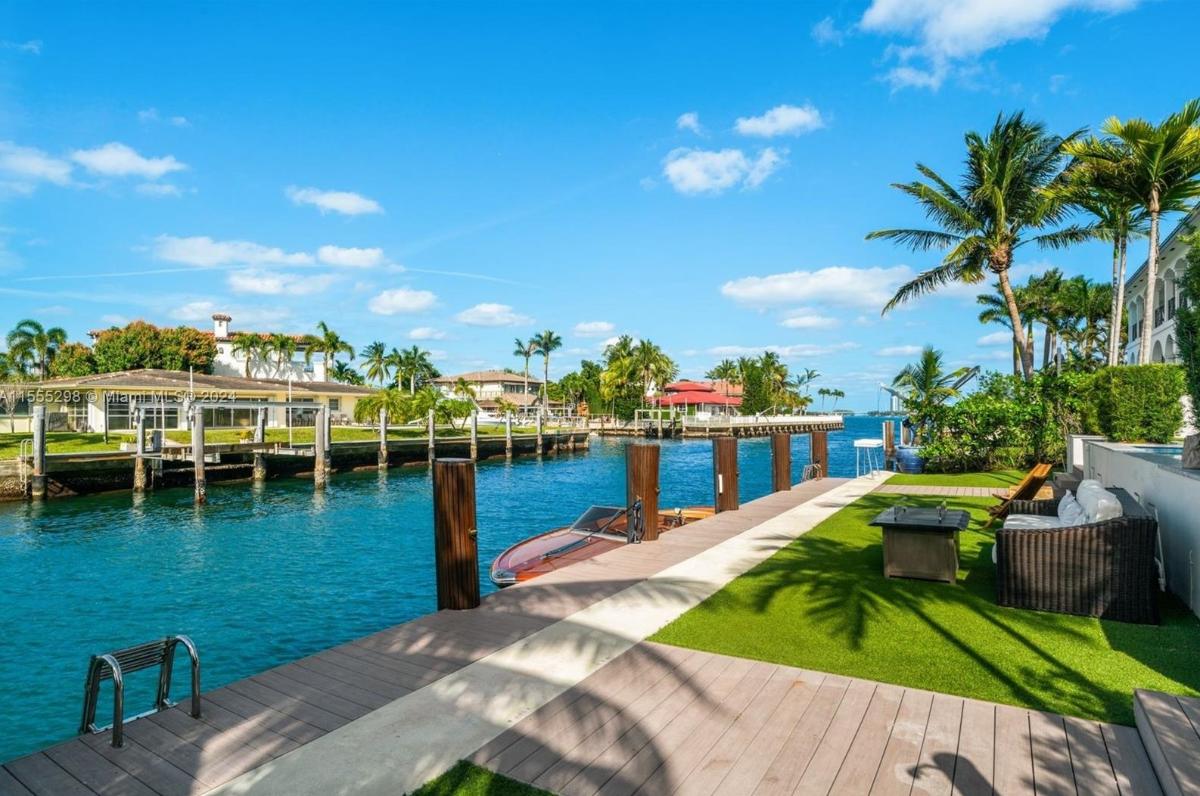 Boat dock with a speed boat.