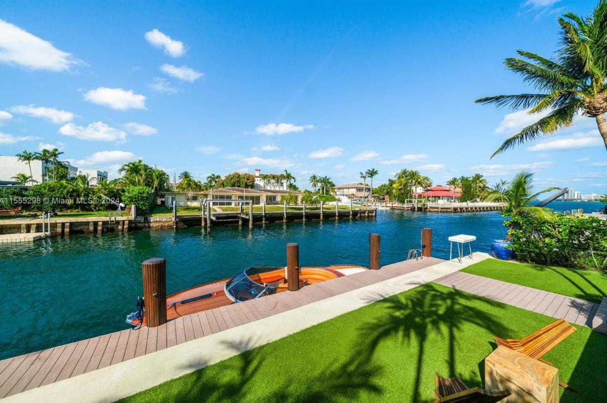 Boat dock with a speed boat.
