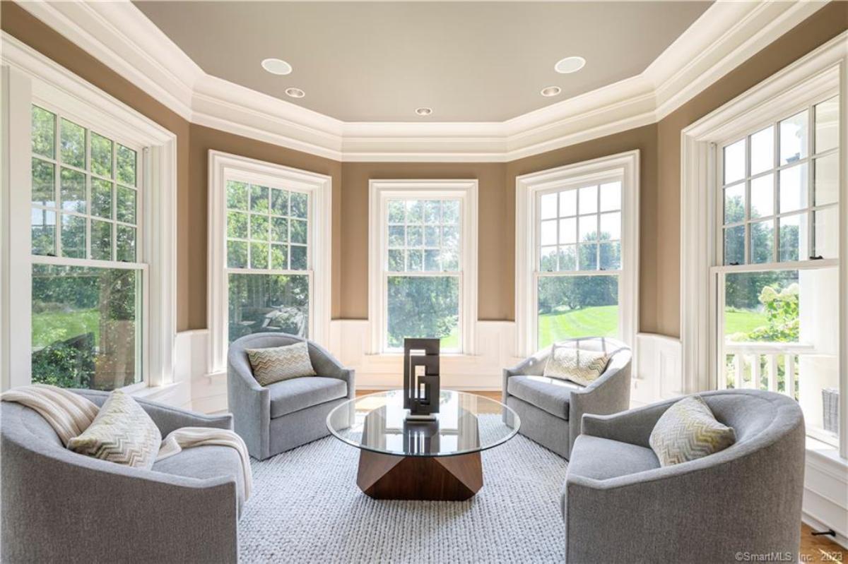 Sunroom with glass windows.