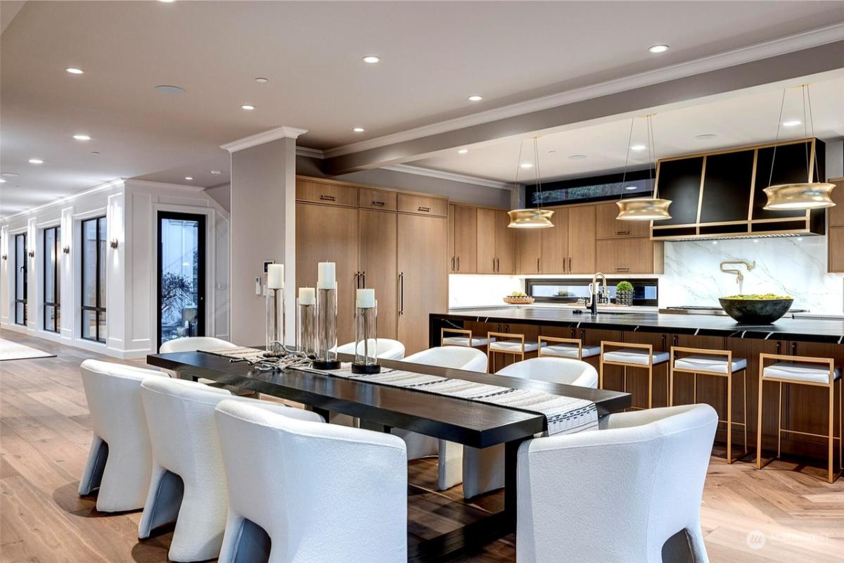 Dining room with a large table and chairs.
