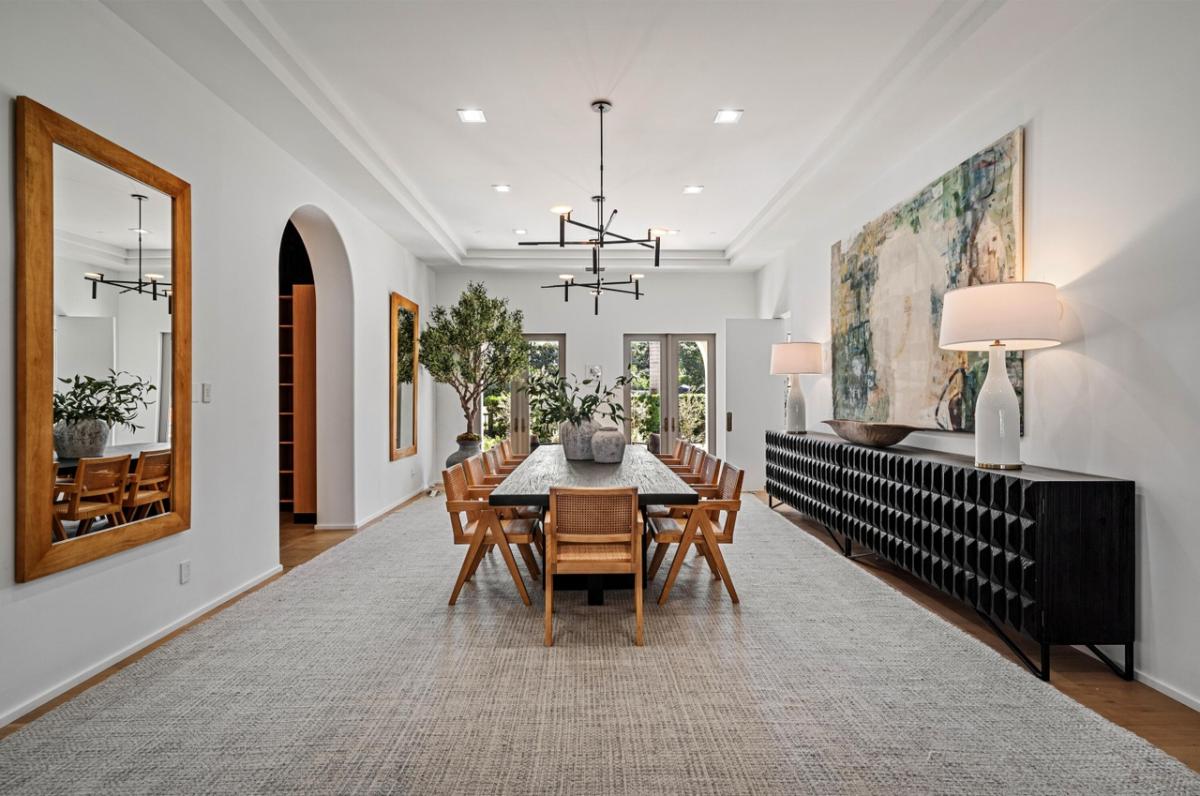 Dining room with a large wood table.